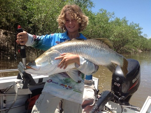 Chris Cleaver with his recently caught and released hybrid cod he likes to call a Murrout (cross between a Murray and trout cod).